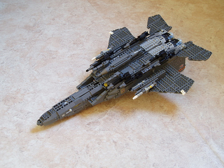 Illustration for article titled Giant LEGO B-1B Bomber Escorted by Fighters, Hawkeye Aircraft